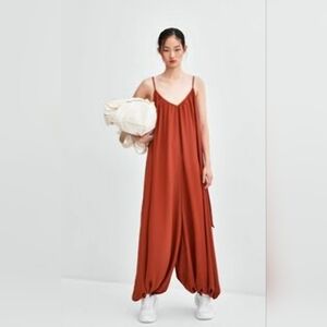 Size M voluminous rust chiffon jumpsuit by Zara